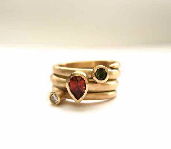 Triple coil and stone ring